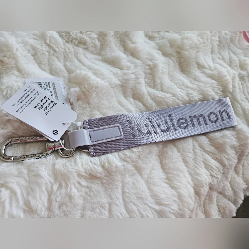 NWT Never Lost Keychain Faint Lavender/Grape Mist